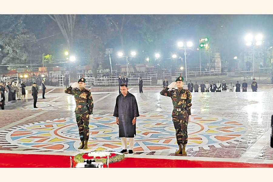 Prime Minister Tarique Rahman pays tributes to Language Movement martyrs at the Central Shaheed Minar in Dhaka in the early hours of Saturday. —Photo: BSS