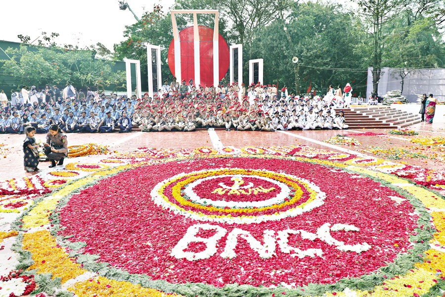 Flowers adorn the Central Shaheed Minar in Dhaka Saturday, the Int’l Mother Language Day. — Photo: Shafiqul Alam