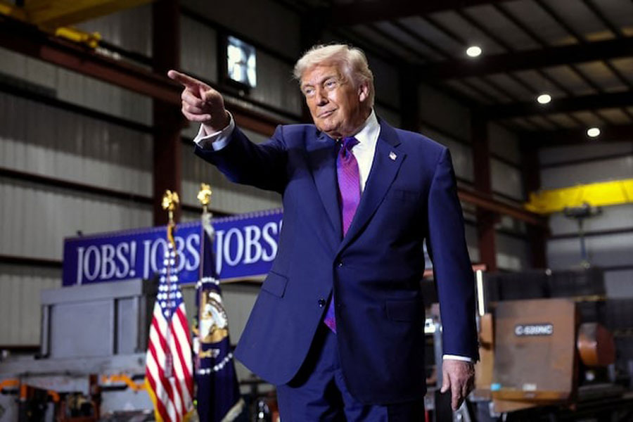 US President Donald Trump points, as he visits Coosa Steel Corporation, in Rome, Georgia, US, February 19, 2026.