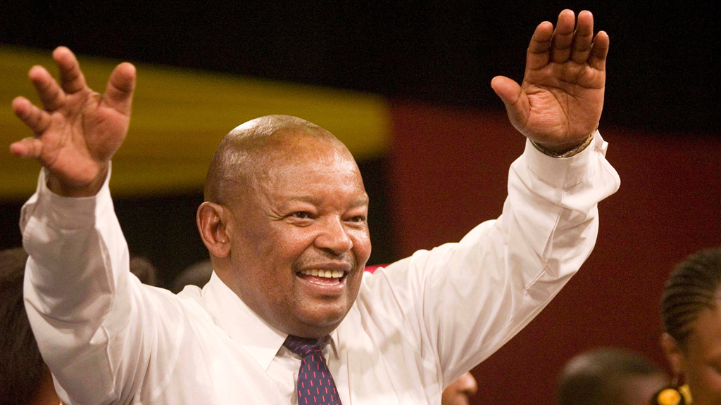 FILE PHOTO: Former South African Defence Minister Mosiuoa Lekota waves to supporters after being elected leader of the country's new Congress of the People (COPE) party at its conference in Bloemfontein Dec 16, 2008. REUTERS