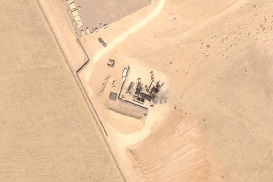 A satellite image taken on March 2, 2026, shows debris surrounding a blackened THAAD radar at the Muwaffaq Salti Air Base in Jordan. (Photo by Airbus)