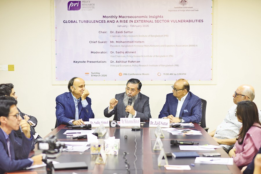 BKMEA President Mohammad Hatem speaks at a discussion titled 'Global turbulences and a rise in external sector vulnerabilities' held at the office of Policy Research Institute of Bangladesh (PRI) on Sunday. PRI Chairman Zaidi Sattar chaired the event, while Vice-Chairman Dr Sadiq Ahmed moderated it.