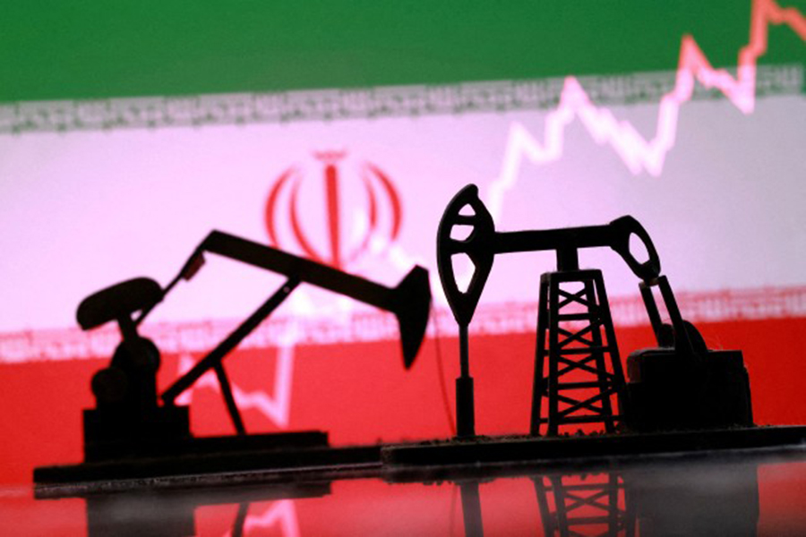 3D-printed oil pump jacks, Iranian flag, and a rising stock graph appear in this illustration taken on March 2, 2026 — Reuters illustration