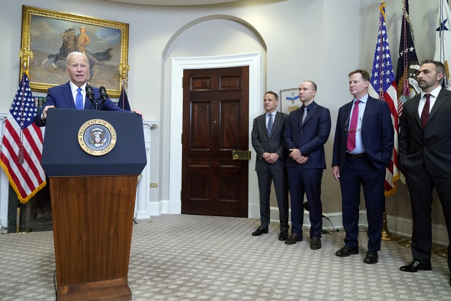 President Joe Biden speaks about artificial intelligence in the Roosevelt Room of the White House, Friday, July 2, 2023, in Washington, as from left, Adam Selipsky, CEO of Amazon Web Services; Greg Brockman, President of OpenAI; Nick Clegg, President of Meta; and Mustafa Suleyman, CEO of Inflection AI, listen. (AP Photo/Manuel Balce Ceneta)