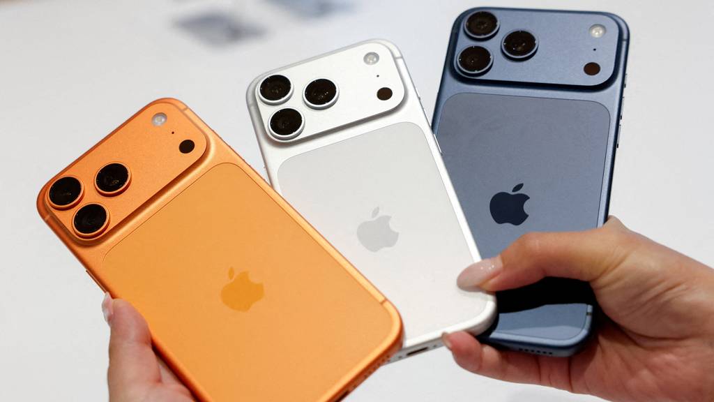 A person holds Apple’s new iPhone 17 series at an Apple store in Taipei, Taiwan, Sept 19, 2025.