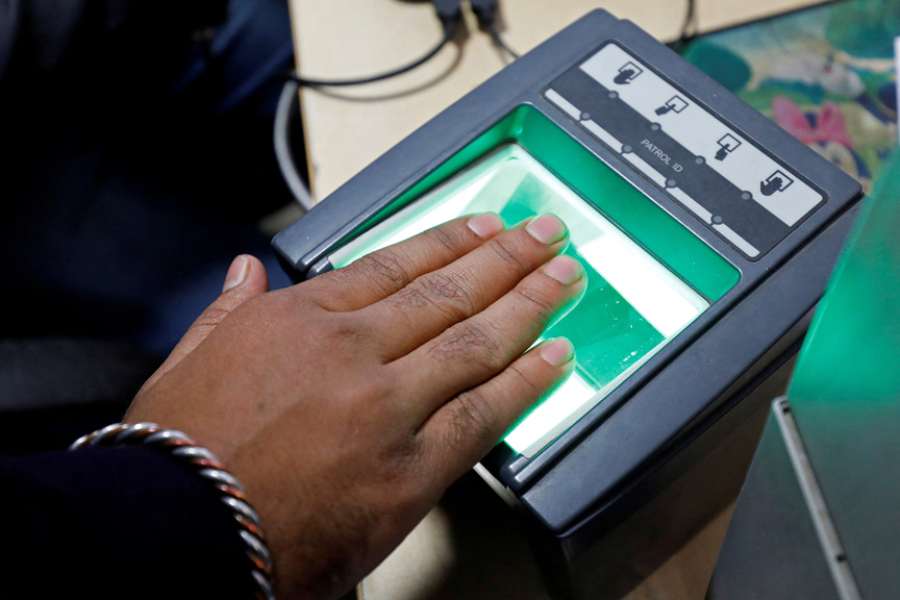 A woman goes through the process of finger scanning for the Unique Identification (UID) database system, also known as Aadhaar, at a registration centre in New Delhi, India, Jan 17, 2018.