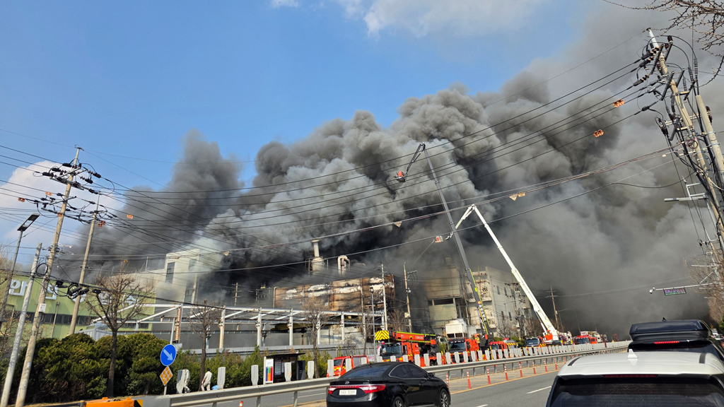 Smoke rises from at a car parts factory in Daejeon, South Korea, Mar 20, 2026. Yonhap via REUTERS