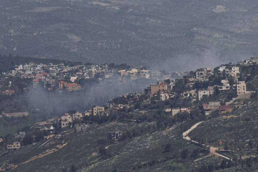 Smoke rises from a Lebanese village near the border with Israel, amid escalation between Iran-backed Hezbollah and Israel, and amid the U.S.-Israeli conflict with Iran, as seen from northern Israel, March 19, 2026.