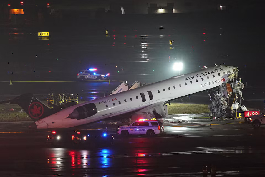 Emergency crews work around an Air Canada Express jet that had collided with a ground vehicle at New York's La Guardia Airport in Queens, New York, US, on March 23, 2026 — Reuters photo