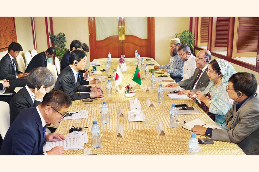 Industries Minister Nurul Majid Mahmud Humayun held a bilateral meeting with Economy, Trade and Industry Minister of Japan Nishimura Yasutoshi at a hotel in Dhaka on Sunday — PID