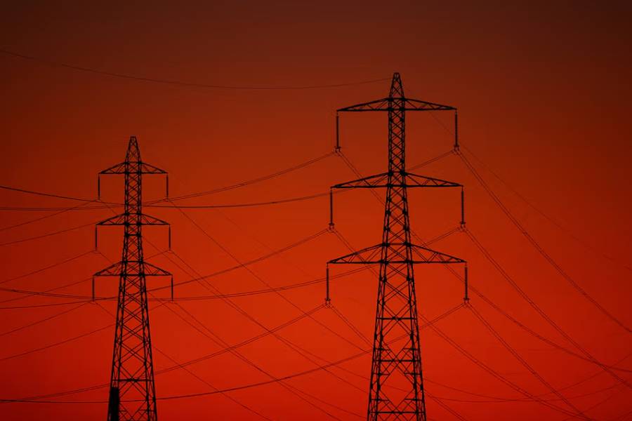 Electrical power pylons and high tension electricity power lines at sunset in Fos sur Mer, France, March 12, 2026.