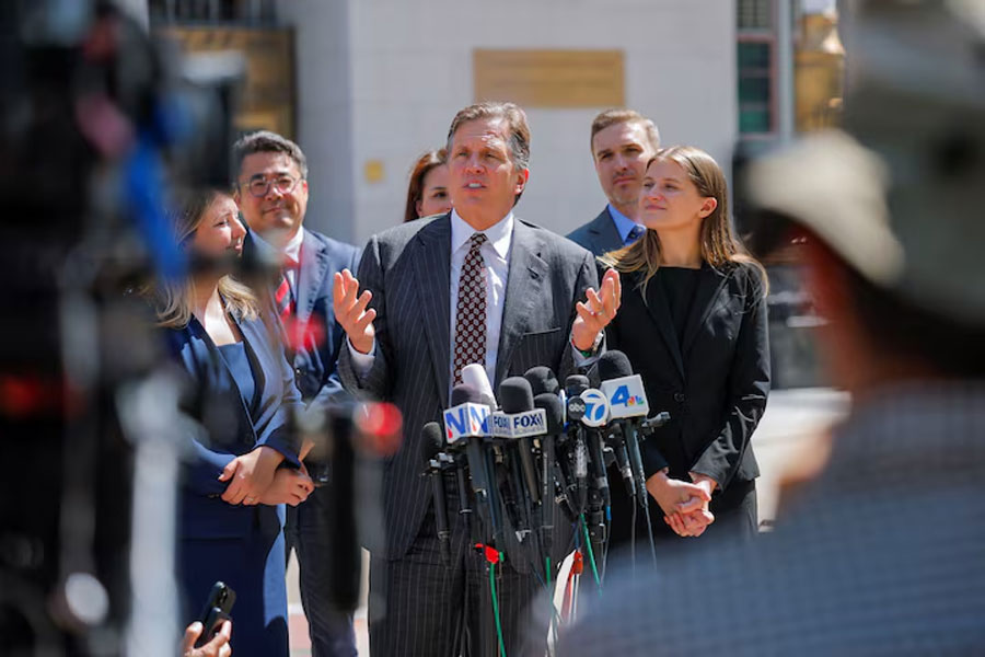 Lawyer Mark Lanier, of the plaintiff Kaley G M, speaks with the media outside the court after the jury found Meta and Google liable in a key test case accusing Meta and Google's YouTube of harming children's mental health through addictive social media platforms, in Los Angeles, California, US, March 25, 2026.
