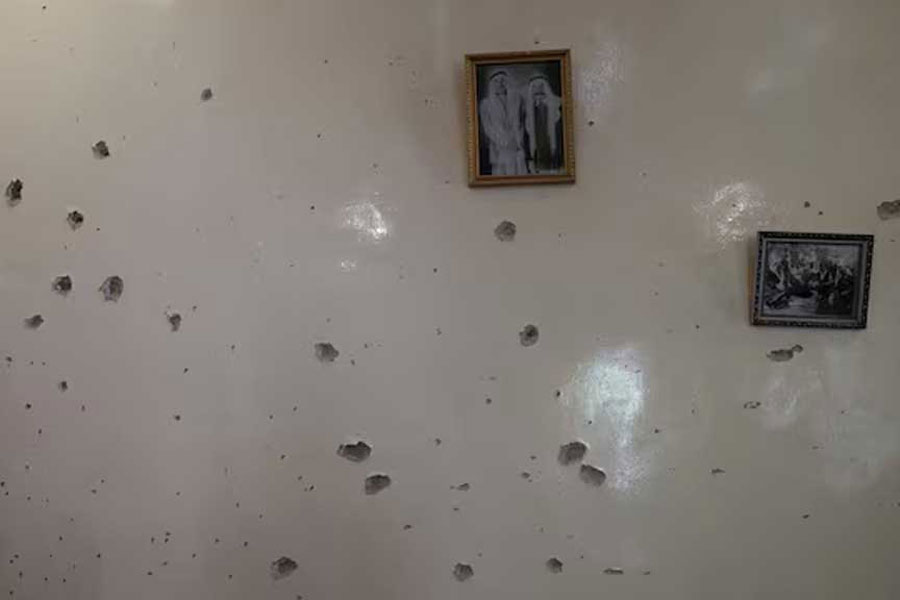 A wall is pockmarked by bullet holes inside the Saraya family house, following sectarian violence in Syria's Sweida province, where government forces were sent to quell local clashes between Druze armed factions and Bedouin tribal fighters, in the predominantly Druze city of Sweida, Syria, Jul 25, 2025.
