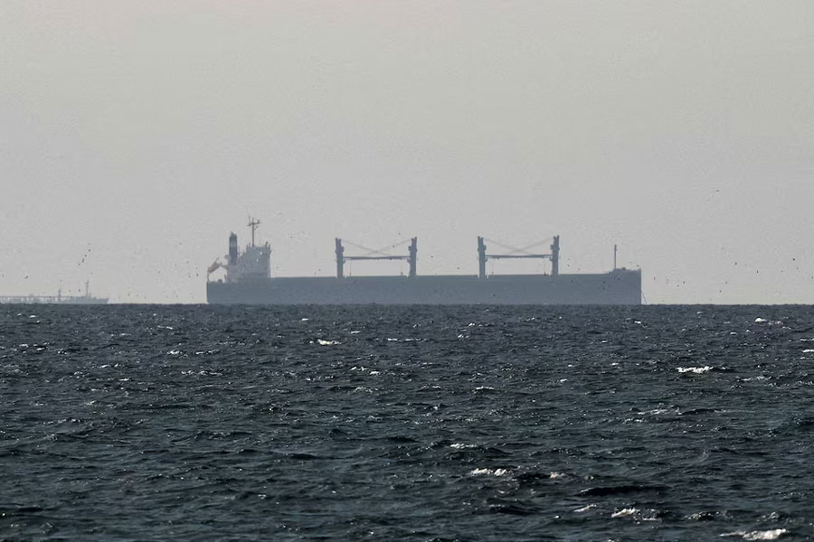A cargo ship in the Gulf, near the Strait of Hormuz, as seen from northern Ras al-Khaimah, near the border with Oman’s Musandam governance, amid the US-Israeli conflict with Iran, in United Arab Emirates, March 11, 2026.