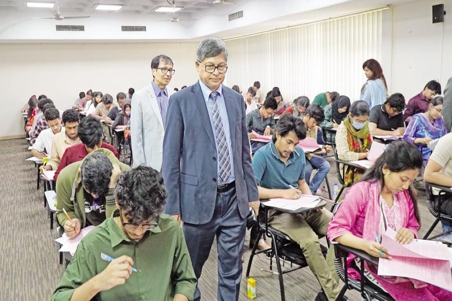 NSU Vice-chancellor Professor Abdul Hannan Chowdhury watching as students sit for test