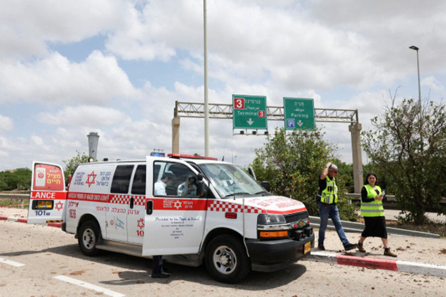Emergency crews are shown at the entrance of Ben Gurion Airport after a missile attack was launched by Yemen's Houthis on Sunday. (Reuters)