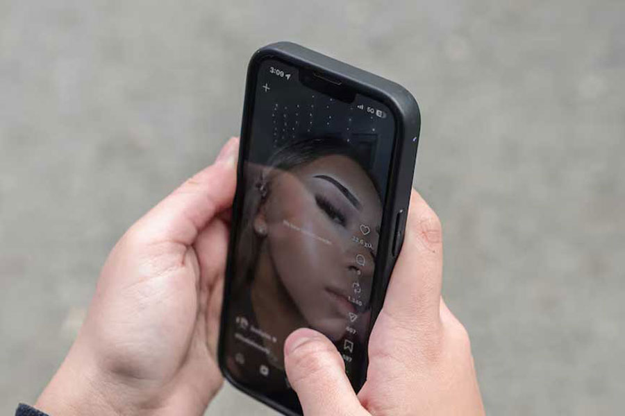 A 14-year-old checks social media posts, as Greece is set to ban under-15s from social media in European crackdown, in Athens, Greece, Feb 26, 2026.