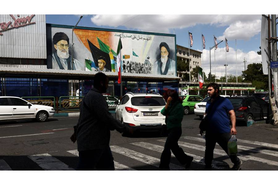 People walk on a street after US President Donald Trump said that he had agreed to a two-week ceasefire with Iran, in Tehran, Iran, Apr 8, 2026.