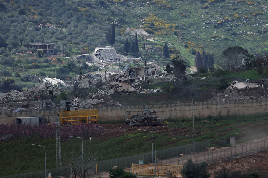 Damaged buildings at Kafr Kila following Israeli army activity across the border between Israel and Lebanon, as seen from Metula on the Israeli side of the border, April 9, 2026.