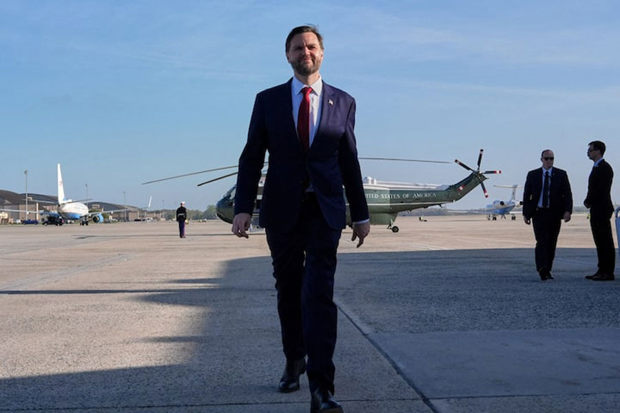 US Vice President JD Vance walks to speak to the media before boarding Air Force Two for expected departure to Pakistan for talks on Iran, at Joint Base Andrews, Maryland, US, April 10, 2026.