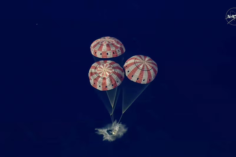 The Artemis II crew capsule splashes down in the Pacific Ocean in this screengrab from a livestream video after the Artemis II crew's flyby of the Moon, on April 10, 2026 — NASA/Handout via REUTERS