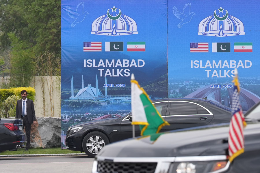 A Pakistani official is seen during the arrival of the U.S. Vice President JD Vance for talks with Iranian officials in Islamabad, Pakistan, Saturday, April 11, 2026. (AP Photo/Jacquelyn Martin, Pool)