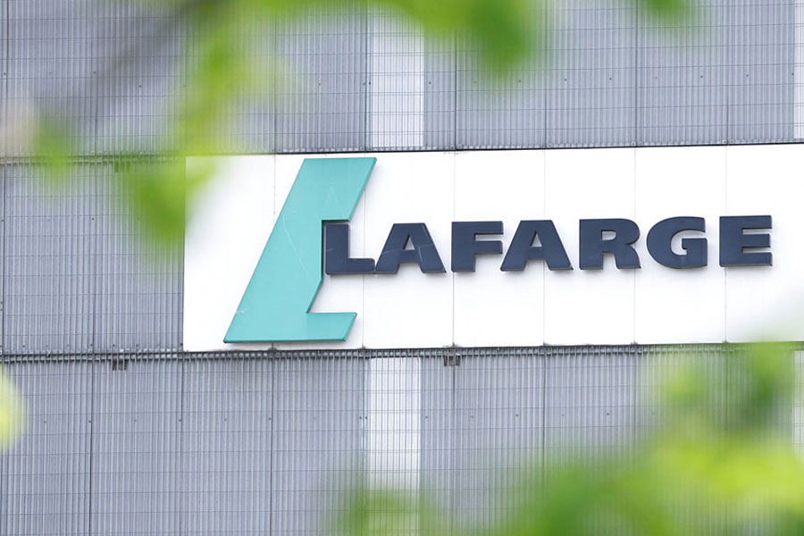 The logo of the French building materials maker, Lafarge, is displayed at Lafarge concrete production plant in Pantin near Paris, France, Paris, Apr 10, 2026.