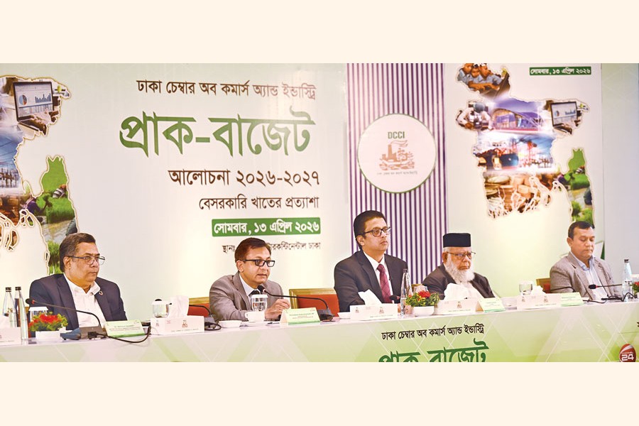 Commerce and Industries Minister Khandakar Abdul Muktadir speaks at a pre-budget discussion organised by the Dhaka Chamber of Commerce and Industry (DCCI) at a city hotel on Monday. ICCB President Mahbubur Rahman was also present. — FE photo
