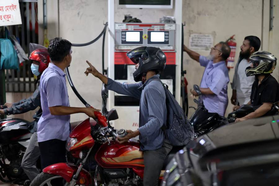 Vehicles refuel at a fuel station, as concerns grow over fuel supply amid the U.S.-Israel conflict with Iran, in Dhaka, Bangladesh, April 6, 2026.