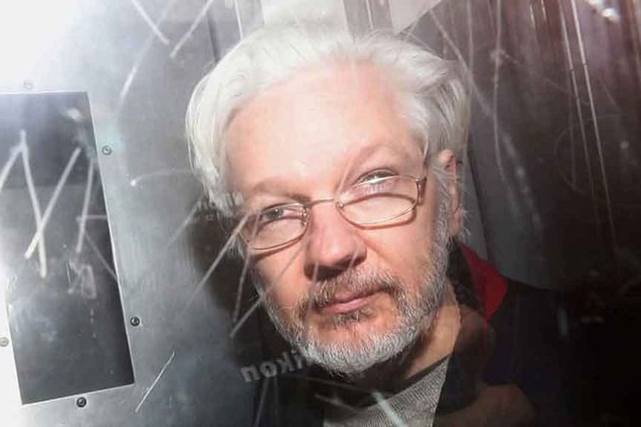 WikiLeaks' founder Julian Assange leaves Westminster Magistrates Court in London, Britain, Jan 13, 2020.