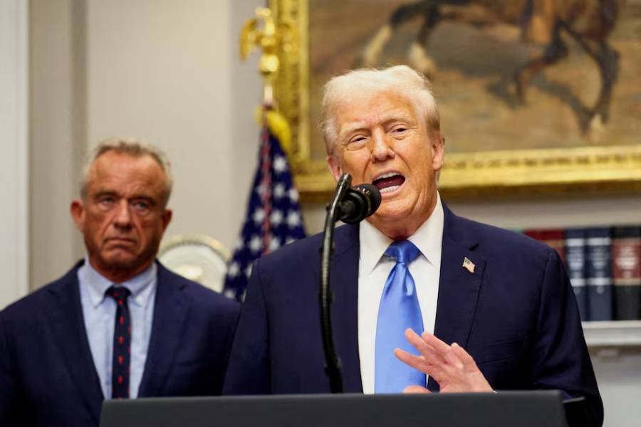 U.S. President Donald Trump, next to U.S. Secretary of Health and Human Services Robert F. Kennedy Jr., makes an announcement linking autism to childhood vaccines and to the use of popular pain medication Tylenol for pregnant women and children, claims which are not backed by decades of science, at the White House, in Washington, D.C., U.S., September 22, 2025.