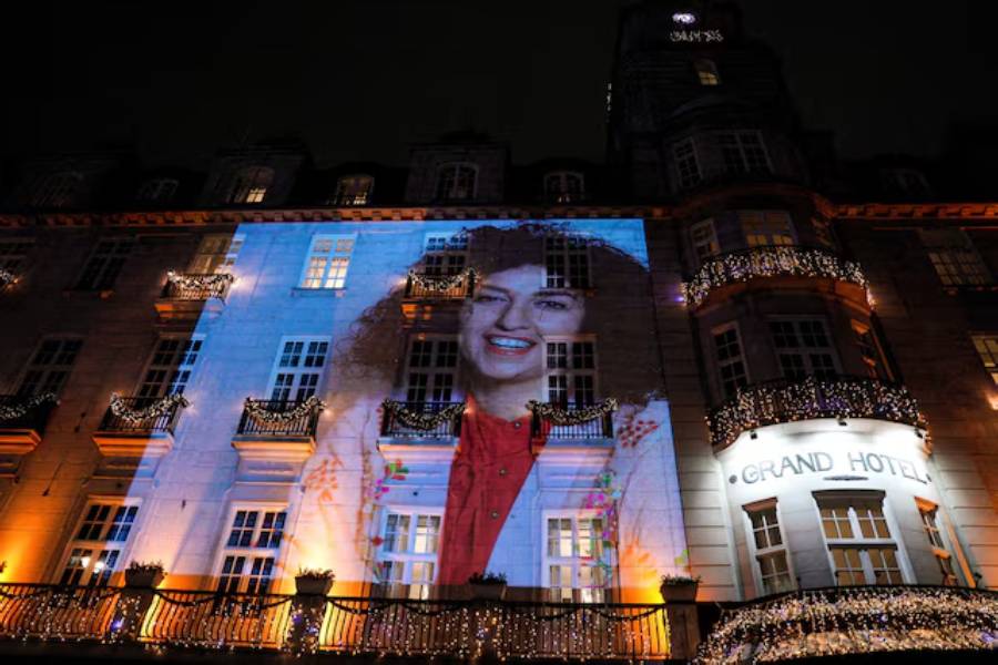A picture of Nobel Peace Prize winner Narges Mohammadi on the wall of the Grand Hotel in central Oslo before the Nobel banquet, in connection with the awarding of the Nobel Peace Prize 2023, in Oslo, Norway December 10, 2023.