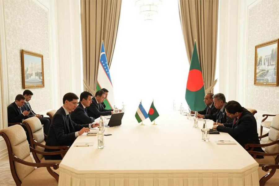 Finance Minister Amir Khosru Mahmud Chowdhury met Uzbekistan Deputy Prime Minister Jamshid Khodjaev in Samarkand on Tuesday. Photo: PID