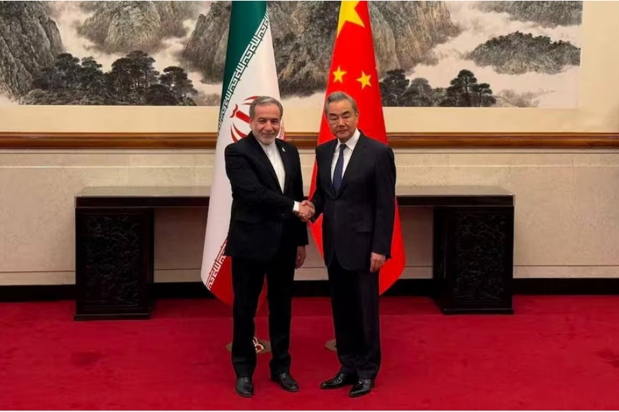 Iranian Foreign Minister Abbas Araqchi meets with Chinese Foreign Minister Wang Yi in a location given as Beijing, China, in this handout image released May 6, 2026.