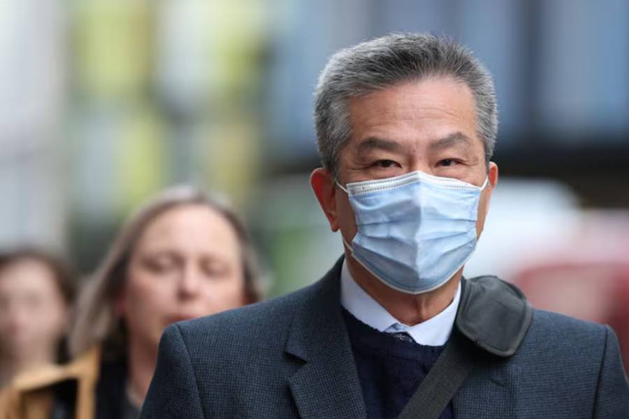 Chung Biu Yuen arrives at the Old Bailey court, during a trial where he and co-defendant Chi Leung Wai are accused of assisting a foreign intelligence service, in London, Britain, May 6, 2026.