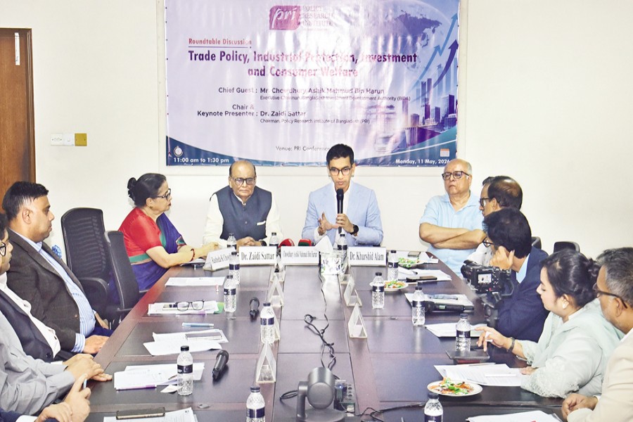 Bangladesh Investment Development Authority (BIDA) Executive Chairman Chowdhury Ashik Mahmud Bin Harun speaks at a roundtable organised by the Centre for Trade Policy and Protection Research of the Policy Research Institute of Bangladesh (PRI) at the PRI Conference Room in the capital on Monday. — FE Photo