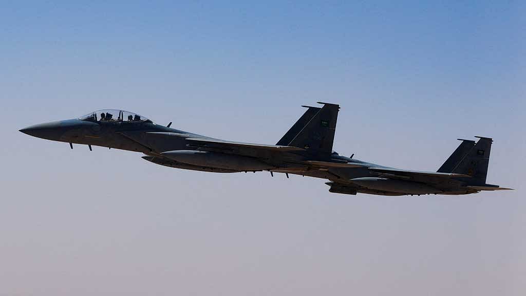 FILE PHOTO: A Saudi fighter jet accompanies Air Force One, carrying US President Donald Trump, on approach to the King Khalid International Airport in Riyadh, Saudi Arabia, May 13, 2025. REUTERS