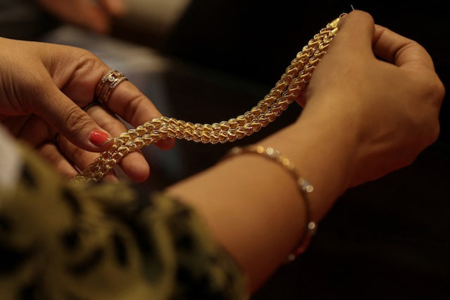 A customer holds a gold chain at a jewellery store in Mumbai, India, on January 30, 2026 — Reuters/File