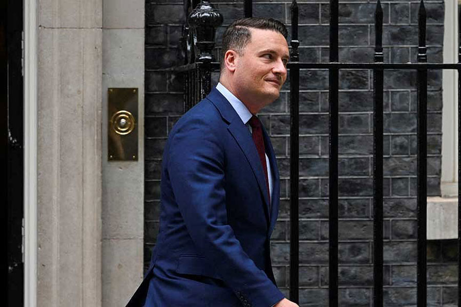 British Health Secretary Wes Streeting walks on Downing Street, on the day of the State Opening of Parliament, in London, Britain, May 13, 2026.