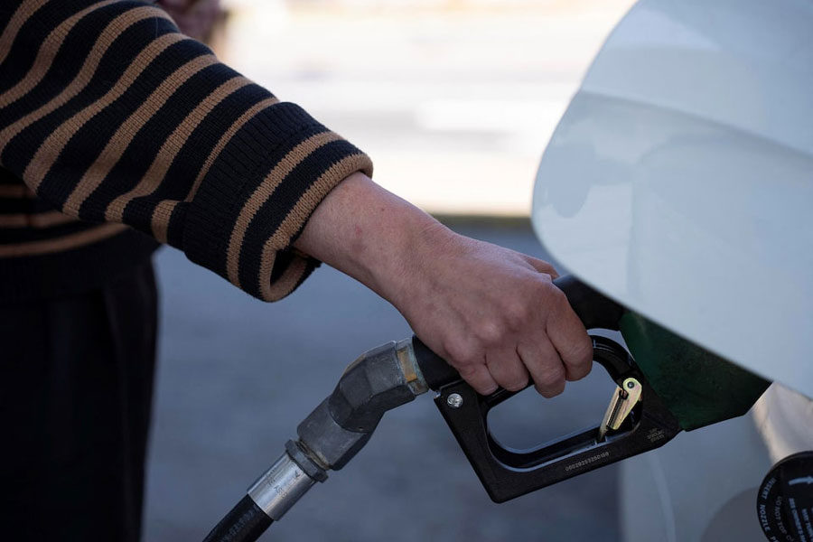 A person pumps their gasoline at a gas station in Atlanta, Georgia, US, March 20, 2026.