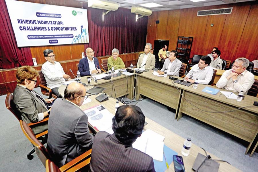 Economists and business leaders attend a pre-budget dialogue titled "Revenue Mobilization: Challenges & Opportunities", organised by the Power and Participation Research Centre in the capital on Saturday. Prime Minister's Adviser on Finance and Planning Dr Rashed Al Mahmud Titumir was present as the chief guest.— FE photo by K Asad-Uz-Zaman