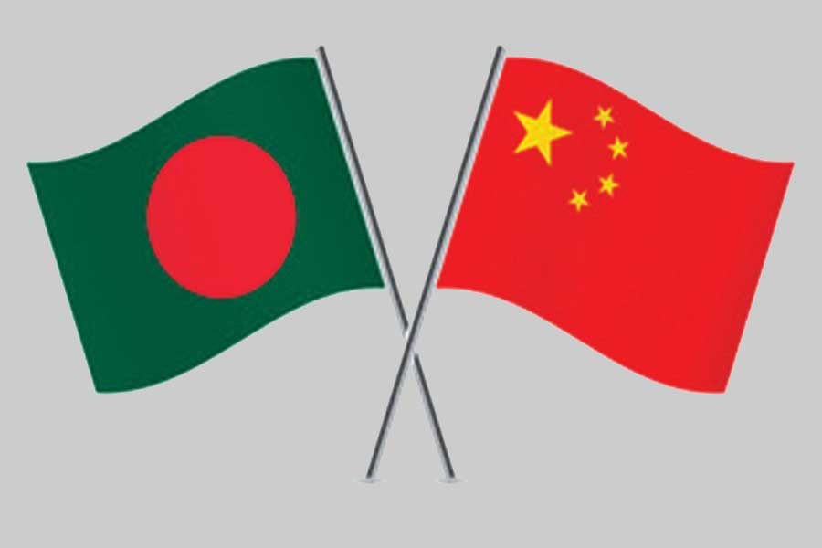 Flags of Bangladesh and China are seen cross-pinned in this photo, symbolising friendship between the two nations