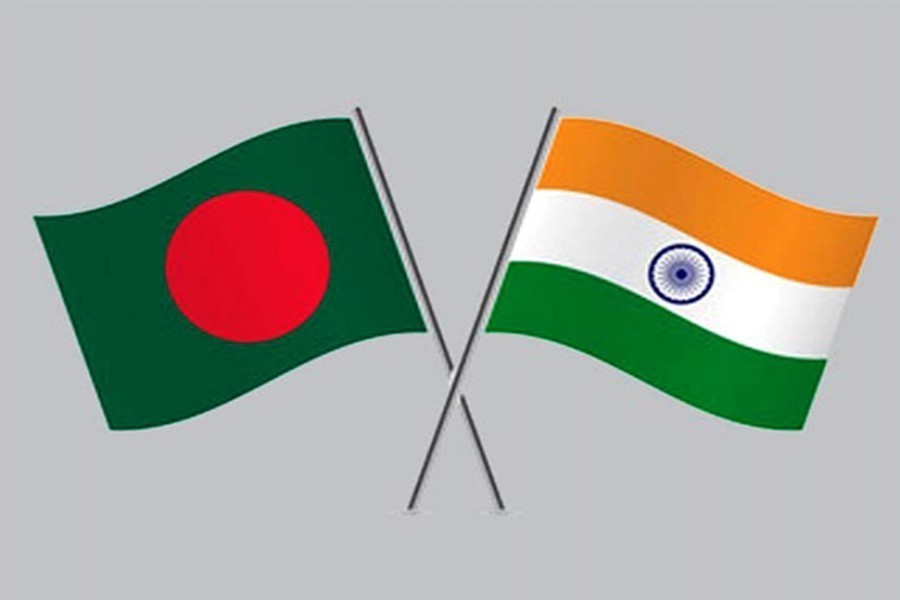 Flags of Bangladesh and India are seen cross-pinned, symbolising friendship between the two nations