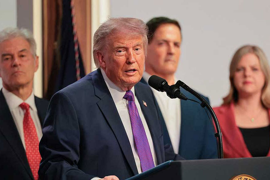 Centre for Medicare & Medicaid Services Administrator Dr Mehmet Oz, Heidi Overton and Mark Cuban listen as US President Donald Trump delivers remarks about health care costs and affordability from an auditorium on the White House campus in Washington, DC, US, May 18, 2026.