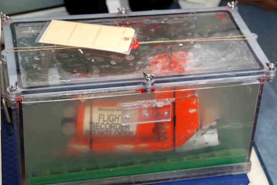 The Cockpit Voice Recorder (CVR), one of two flight recorders from the Rio-Paris Air France flight which crashed in 2009, is carrying to be displayed for the media before a news conference at the BEA headquarters in Le Bourget, northern Paris, May 12, 2011. –Reuters file photo