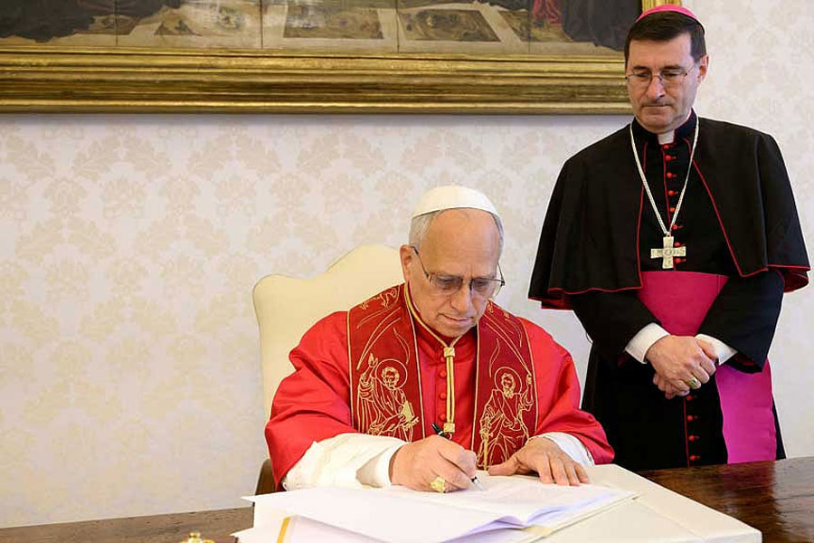 Pope Leo XIV signs "Magnifica humanitas" (Magnificent Humanity) at the Vatican, May 15, 2026.