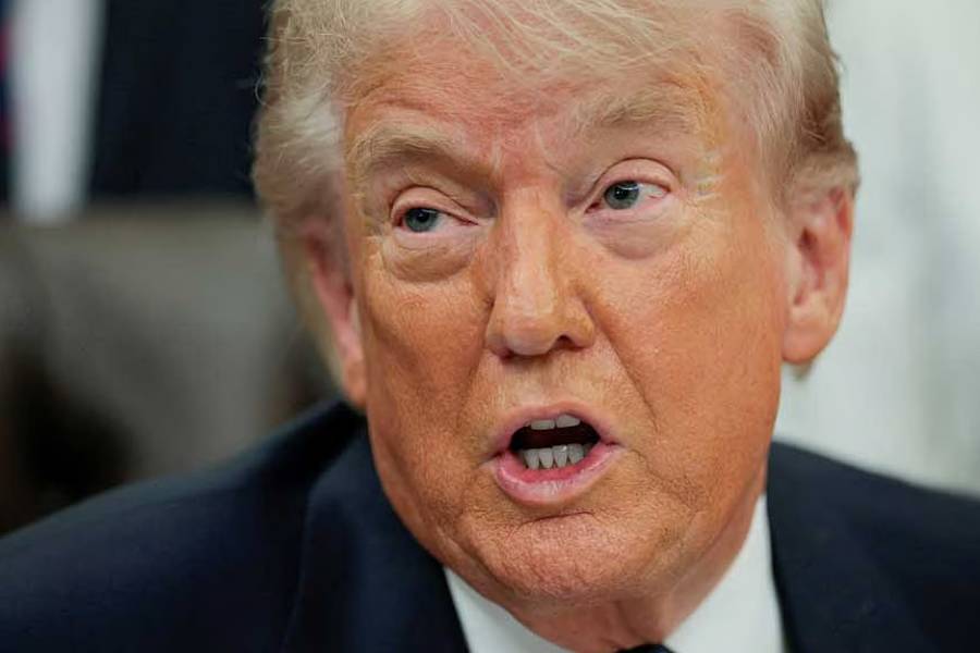 US President Donald Trump speaks during an event to sign a memorandum in the Oval Office at the White House in Washington, DC, US, May 5, 2026.