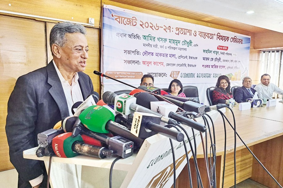 Finance Minister Amir Khosru Mahmud Chowdhury speaking at a pre-budget discussion meeting organised by Economic Reporters' Forum (ERF) at its auditorium in the city on Tuesday — FE photo