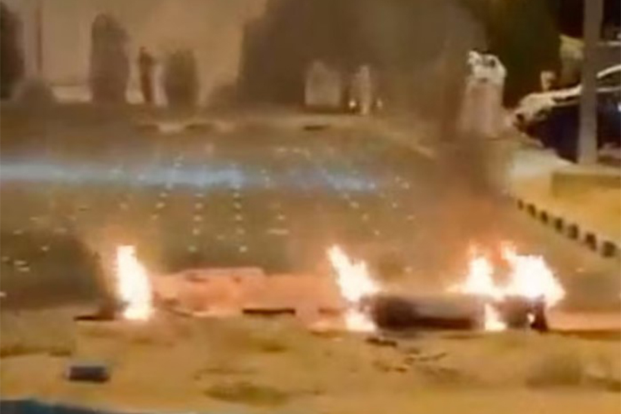 Debris burns on the ground in a parking lot following reports of missile and drone attacks, in Sabah Al Nasser, Kuwait June 3, 2026, in this screengrab obtained from a social media video — SOCIAL MEDIA/via REUTERS