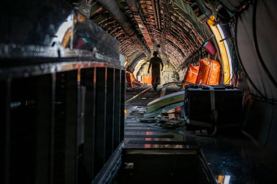 A U.S. Air Force boom operator performs a pre-flight inspection of a KC-135 Stratotanker at a base in the U.S. Central Command area of responsibility, May 27, 2026.
